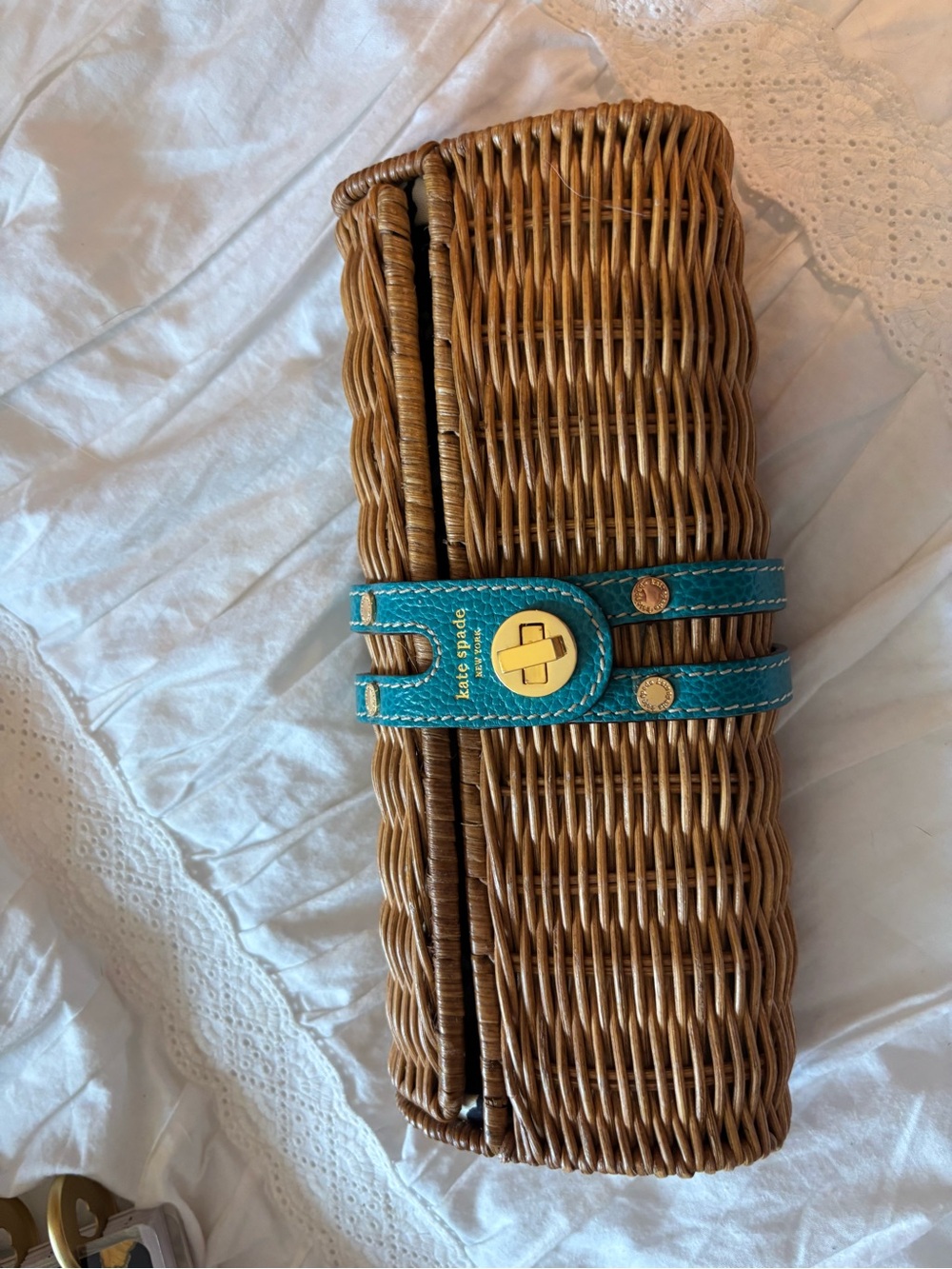 kate spade wicker clutch with teal strap and gold hardware